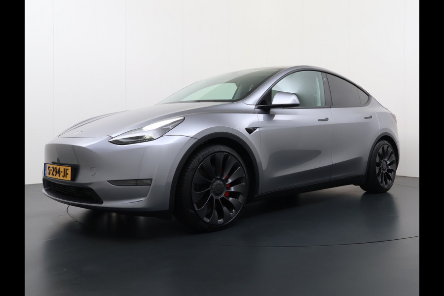 Tesla Model Y Performance 534pk 0-100 3,8 sec. Trekhaak AWD 78,1kWh Warmte-pomp FSD-Comp.3 AutoPilot Carbon-Spoiler Elekr.Achterklep AMD-Ryzen 3xCamera Navi LED ACC DAB Voorverwarmen interieur en Keyless via App One-Pedal-Drive Rode Remklauwen Garantie op Accu 03-02-2031 maz. 192.000km max. 250Kw laadvermogen !