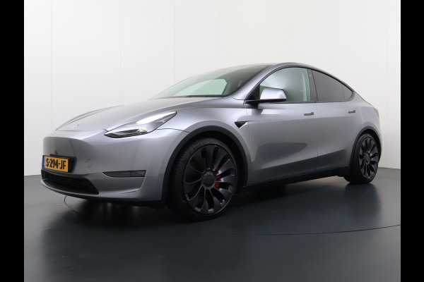 Tesla Model Y Performance 534pk 0-100 3,8 sec. Trekhaak AWD 78,1kWh Warmte-pomp FSD-Comp.3 AutoPilot Carbon-Spoiler Elekr.Achterklep AMD-Ryzen 3xCamera Navi LED ACC DAB Voorverwarmen interieur en Keyless via App One-Pedal-Drive Rode Remklauwen Garantie op Accu 03-02-2031 maz. 192.000km max. 250Kw laadvermogen !
