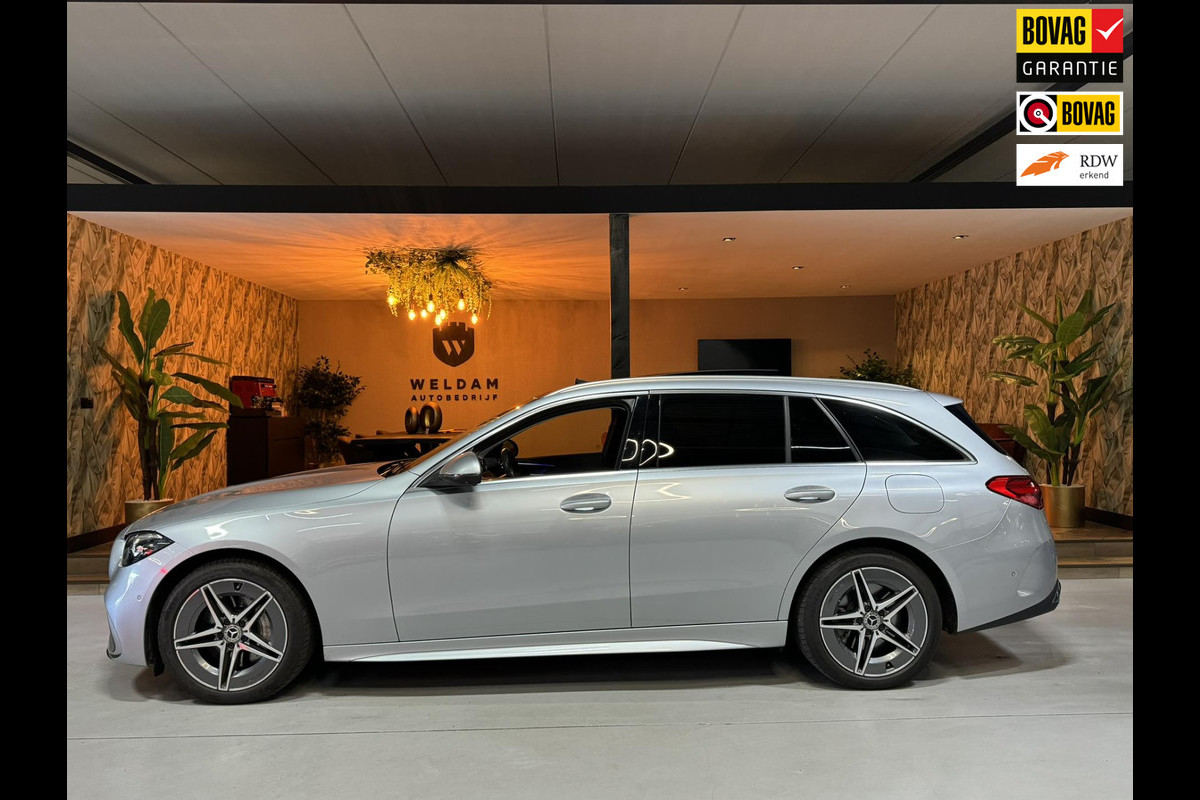 Mercedes-Benz C-Klasse Estate 300 e AMG Line Garantie Trekhaak Massage Pano Ambient 360 Blindspot Elek Achterklep StuurVW Rijklaar