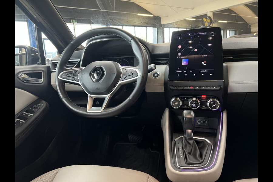Renault Clio 1.6 E-Tech Hybrid 140 Initiale Paris | Groot Navi | Bose | 360 | PDC V+A | Stoel & stuurverwarming | 17" | 100% Dealer onderhouden!