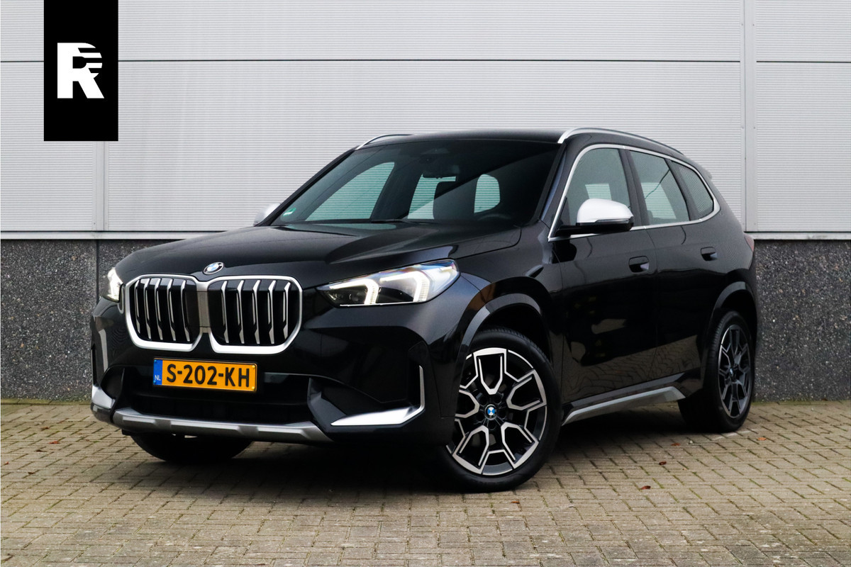 BMW X1 sDrive18i X-Line / Trekhaak / Adaptieve Cruise / 19inch / Camera /