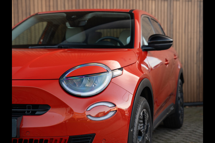 Fiat 600 1.2 Hybrid La Prima 145pk | Full option | CarPlay | Arancio Sun of Italy