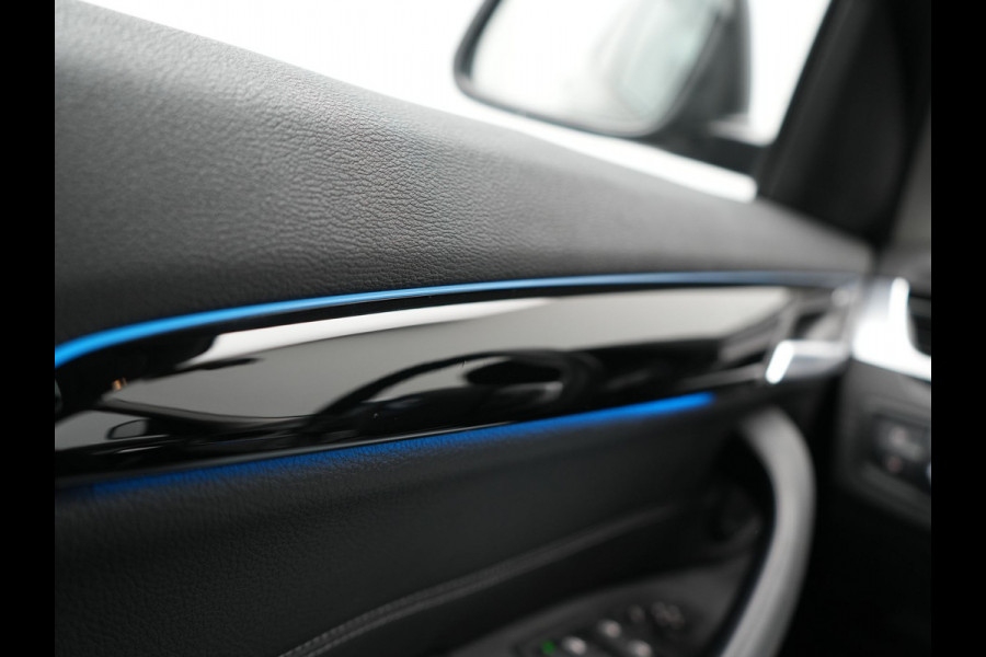 BMW X1 xDrive25e Sportline Plug In Hybrid 221pk Dealer O.H. PHEV | Trekhaak | Panodak | Adaptive Cruise | Camera | Lederen Sportstoelen Memory & Verwarmd | Sfeerverlichting | Navigatie | DAB |