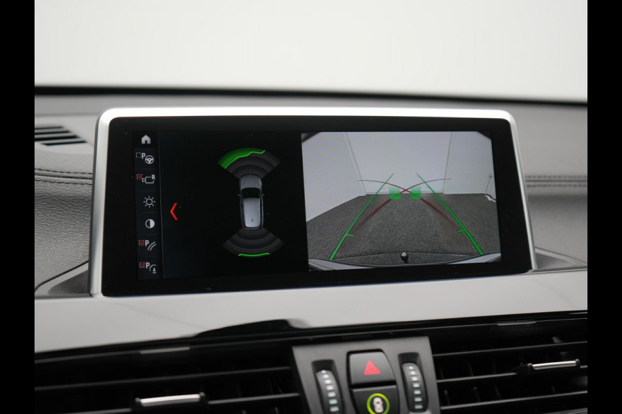 BMW X1 xDrive25e Sportline Plug In Hybrid 221pk Dealer O.H. PHEV | Trekhaak | Panodak | Adaptive Cruise | Camera | Lederen Sportstoelen Memory & Verwarmd | Sfeerverlichting | Navigatie | DAB |