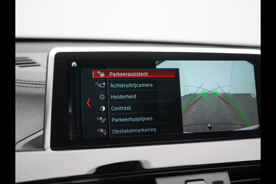 BMW X1 xDrive25e Sportline Plug In Hybrid 221pk Dealer O.H. PHEV | Trekhaak | Panodak | Adaptive Cruise | Camera | Lederen Sportstoelen Memory & Verwarmd | Sfeerverlichting | Navigatie | DAB |