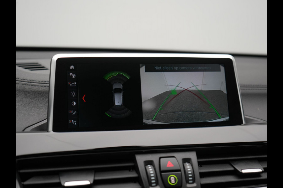 BMW X1 xDrive25e Sportline Plug In Hybrid 221pk Dealer O.H PHEV | Panodak | Adaptive Cruise | Camera | Sportstoelen Verwarmd | Sfeerverlichting | Navigatie | DAB |