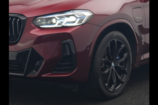 BMW X3 xDrive30e M Sport Plug In Hybrid 293pk Dealer O.H. PHEV | Trekhaak Af Fabriek | Panodak | Head Up | 360 Camera | Laser LED | 20"L.M | Lederen Sportstoelen Ventilatie &  Memory | Sfeerverlichting | Stoelen & Stuur Verwarmd | Aventurinrot III M