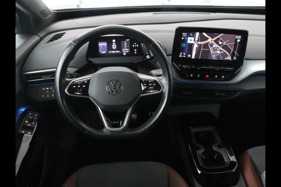 Volkswagen ID.4 First 77 kWh | Stoel & stuurverwarming | Camera | Carplay | Adaptive cruise | Half leder | 20'' | Navigatie | DAB | Sfeerverlichting