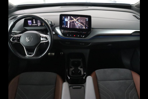 Volkswagen ID.4 First 77 kWh | Stoel & stuurverwarming | Camera | Carplay | Adaptive cruise | Half leder | 20'' | Navigatie | DAB | Sfeerverlichting