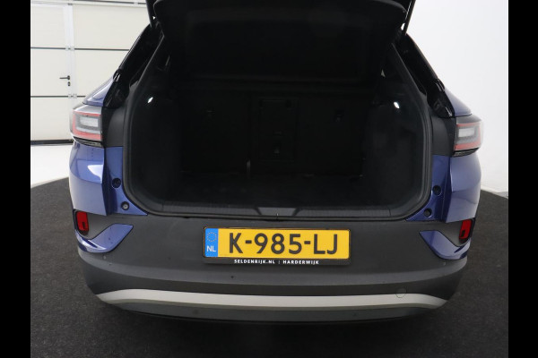 Volkswagen ID.4 First 77 kWh | Stoel & stuurverwarming | Camera | Carplay | Adaptive cruise | Half leder | 20'' | Navigatie | DAB | Sfeerverlichting