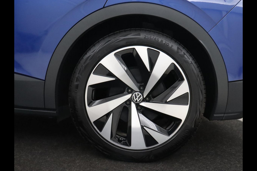 Volkswagen ID.4 First 77 kWh | Stoel & stuurverwarming | Camera | Carplay | Adaptive cruise | Half leder | 20'' | Navigatie | DAB | Sfeerverlichting