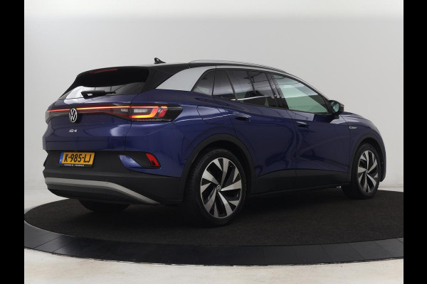 Volkswagen ID.4 First 77 kWh | Stoel & stuurverwarming | Camera | Carplay | Adaptive cruise | Half leder | 20'' | Navigatie | DAB | Sfeerverlichting