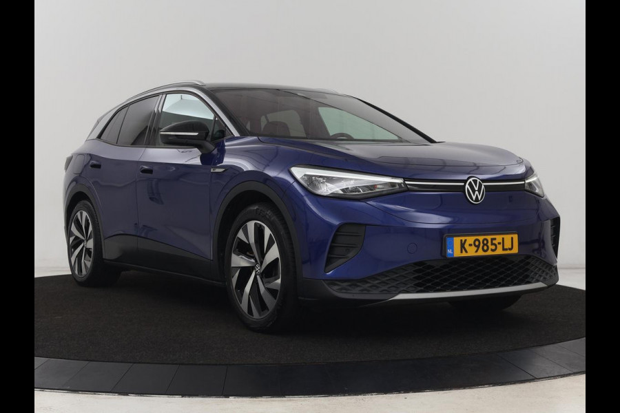 Volkswagen ID.4 First 77 kWh | Stoel & stuurverwarming | Camera | Carplay | Adaptive cruise | Half leder | 20'' | Navigatie | DAB | Sfeerverlichting