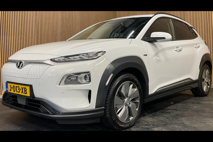Hyundai Kona EV Premium 64 kWh|GROTE ACCU|100%SOH|FACELIFT|3-FASE|TREKH|HUD|LEDER|ACC|STUURVERW|STOELVERW+VENT.|CAMERA|CARPLAY|NL|