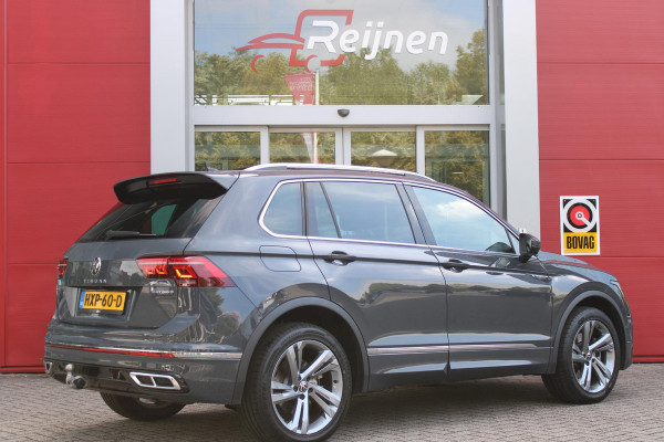 Volkswagen Tiguan 1.4 TSI 245PK eHybrid R-LINE BUSINESS + | BEKLEDING LEDER VIENNA | PANORAMISCH SCHUIF/KANTEL DAK | ELEKTRISCH WEGKLAPENBARE TREKHAAK | R-LINE INTERIEUR/EXTERIEUR | VERWARMBARE VOORSTOELEN/STUUR | ELEKTRISCH BEDIENBARE VOORSTOELEN MET GEHEUGEN FUNCTIE | AKOESTISCH GLAS GETINT | KEYLESS ACCESS/START | ELEKTRISCH BEDIENABRE ACHTERKLEP | DAKSPOILER R-LINE | SFEER VERLICHTING | RIJASSISTENT PAKKET O.A. LANE ASSIST EN ADAPTIVE CRUISE CONTROL EN DODEHOEK DETECTIE | NAVIGATIE | APPLE CARPLAY/ANDROID AUTO | DAB+ RADIO | LED MATRIX KOPLAMPEN (IQ LIGHT) | DRAADLOZE TELEFOONLADER