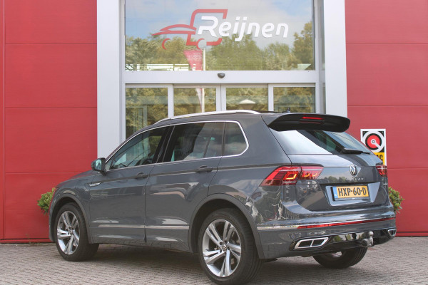 Volkswagen Tiguan 1.4 TSI 245PK eHybrid R-LINE BUSINESS + | BEKLEDING LEDER VIENNA | PANORAMISCH SCHUIF/KANTEL DAK | ELEKTRISCH WEGKLAPENBARE TREKHAAK | R-LINE INTERIEUR/EXTERIEUR | VERWARMBARE VOORSTOELEN/STUUR | ELEKTRISCH BEDIENBARE VOORSTOELEN MET GEHEUGEN FUNCTIE | AKOESTISCH GLAS GETINT | KEYLESS ACCESS/START | ELEKTRISCH BEDIENABRE ACHTERKLEP | DAKSPOILER R-LINE | SFEER VERLICHTING | RIJASSISTENT PAKKET O.A. LANE ASSIST EN ADAPTIVE CRUISE CONTROL EN DODEHOEK DETECTIE | NAVIGATIE | APPLE CARPLAY/ANDROID AUTO | DAB+ RADIO | LED MATRIX KOPLAMPEN (IQ LIGHT) | DRAADLOZE TELEFOONLADER