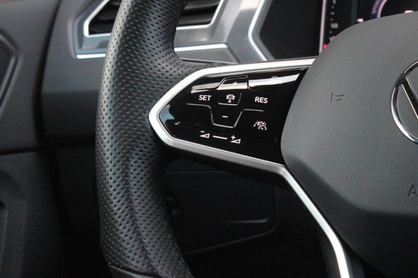 Volkswagen Tiguan 1.4 TSI 245PK eHybrid R-LINE BUSINESS + | BEKLEDING LEDER VIENNA | PANORAMISCH SCHUIF/KANTEL DAK | ELEKTRISCH WEGKLAPENBARE TREKHAAK | R-LINE INTERIEUR/EXTERIEUR | VERWARMBARE VOORSTOELEN/STUUR | ELEKTRISCH BEDIENBARE VOORSTOELEN MET GEHEUGEN FUNCTIE | AKOESTISCH GLAS GETINT | KEYLESS ACCESS/START | ELEKTRISCH BEDIENABRE ACHTERKLEP | DAKSPOILER R-LINE | SFEER VERLICHTING | RIJASSISTENT PAKKET O.A. LANE ASSIST EN ADAPTIVE CRUISE CONTROL EN DODEHOEK DETECTIE | NAVIGATIE | APPLE CARPLAY/ANDROID AUTO | DAB+ RADIO | LED MATRIX KOPLAMPEN (IQ LIGHT) | DRAADLOZE TELEFOONLADER