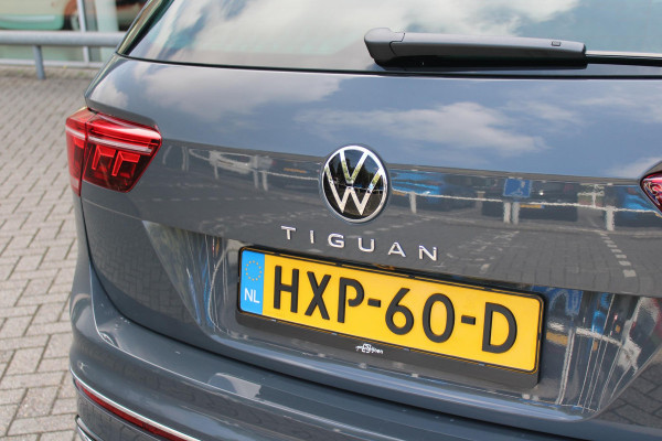 Volkswagen Tiguan 1.4 TSI 245PK eHybrid R-LINE BUSINESS + | BEKLEDING LEDER VIENNA | PANORAMISCH SCHUIF/KANTEL DAK | ELEKTRISCH WEGKLAPENBARE TREKHAAK | R-LINE INTERIEUR/EXTERIEUR | VERWARMBARE VOORSTOELEN/STUUR | ELEKTRISCH BEDIENBARE VOORSTOELEN MET GEHEUGEN FUNCTIE | AKOESTISCH GLAS GETINT | KEYLESS ACCESS/START | ELEKTRISCH BEDIENABRE ACHTERKLEP | DAKSPOILER R-LINE | SFEER VERLICHTING | RIJASSISTENT PAKKET O.A. LANE ASSIST EN ADAPTIVE CRUISE CONTROL EN DODEHOEK DETECTIE | NAVIGATIE | APPLE CARPLAY/ANDROID AUTO | DAB+ RADIO | LED MATRIX KOPLAMPEN (IQ LIGHT) | DRAADLOZE TELEFOONLADER