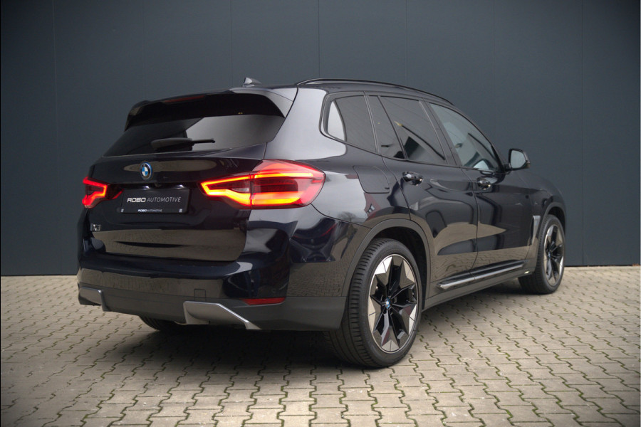 BMW iX3 High Executive 80 kWh | Panoramadak | Keyless | Stoelverwarming | Harman Kardon | Memory Seat | Head-Up Display | 360 Camera | Ambiance Verlichting | Trekhaak | Adaptive LED | Elektrische Stoelen | Apple Carplay |