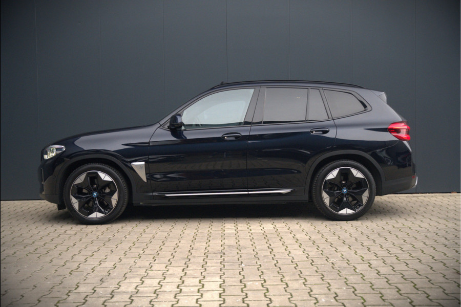 BMW iX3 High Executive 80 kWh | Panoramadak | Keyless | Stoelverwarming | Harman Kardon | Memory Seat | Head-Up Display | 360 Camera | Ambiance Verlichting | Trekhaak | Adaptive LED | Elektrische Stoelen | Apple Carplay |