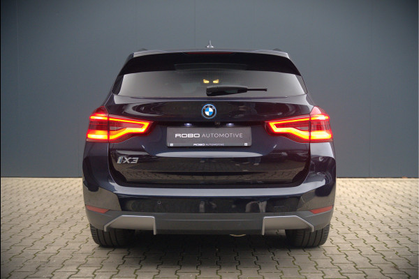BMW iX3 High Executive 80 kWh | Panoramadak | Keyless | Stoelverwarming | Harman Kardon | Memory Seat | Head-Up Display | 360 Camera | Ambiance Verlichting | Trekhaak | Adaptive LED | Elektrische Stoelen | Apple Carplay |