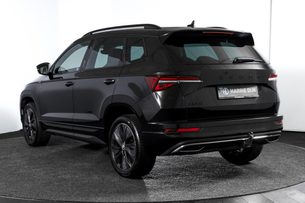 Škoda Karoq 1.5 TSI ACT 150 PK Sportline Business - Automaat | Elek. Trekhaak | Dig. Cockpit | Adapt. Cruise | PDC | Camera | NAV + App. Connect | ECC | DAB | LM 18" | 7979