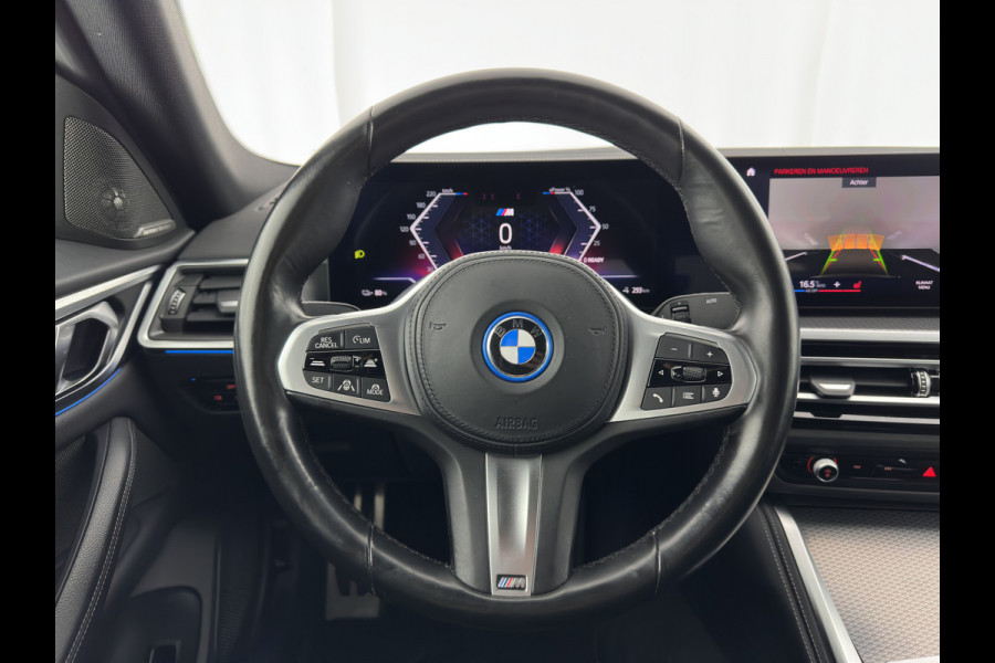 BMW i4 eDrive40 High Executive 84 kWh (3-Fase) [SOH-97%] (INCL-BTW) *AUT | HEAD UP | FULL-LED | HARMAN KARDON | ADAPTIVE-CRUISE | WIDE-SCREEN-DIGI-COCKPIT | DAB+ | CAMERA | AMBIENT-LIGHT | CARPLAY | LEATHER SPORT-SEATS |  | 19''ALU*