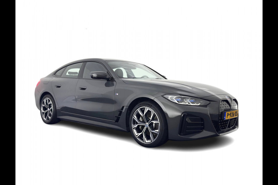BMW i4 eDrive40 High Executive 84 kWh (3-Fase) [SOH-97%] (INCL-BTW) *AUT | HEAD UP | FULL-LED | HARMAN KARDON | ADAPTIVE-CRUISE | WIDE-SCREEN-DIGI-COCKPIT | DAB+ | CAMERA | AMBIENT-LIGHT | CARPLAY | LEATHER SPORT-SEATS |  | 19''ALU*