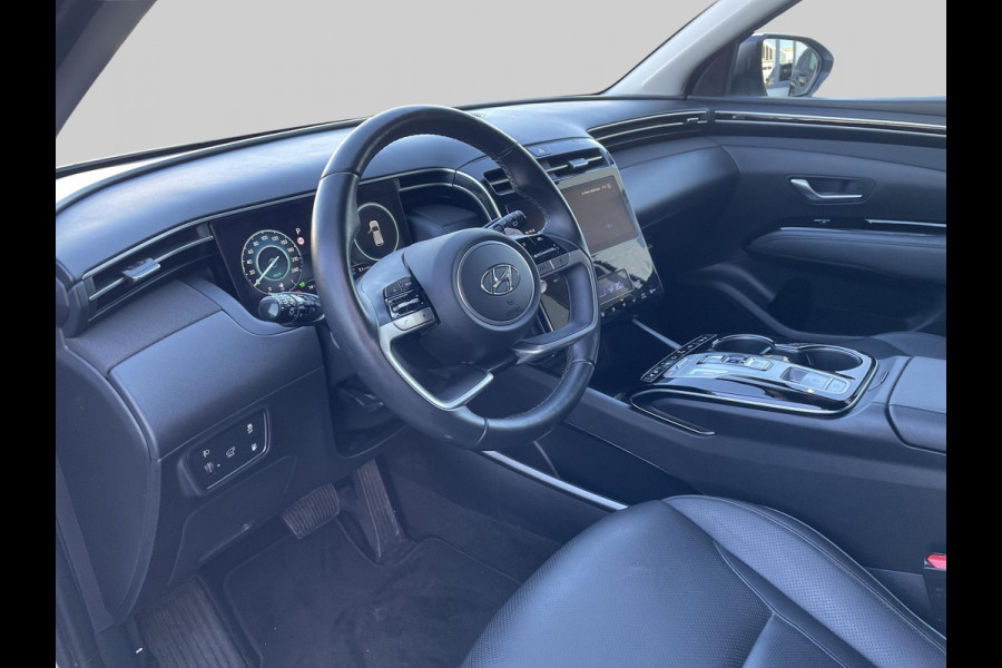 Hyundai Tucson 1.6 T-GDI PHEV Premium Sky 4WD | Glazen schuifkanteldak | Navigatie | Leder