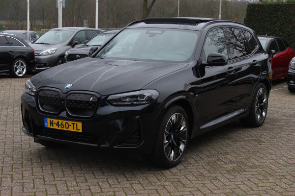 BMW iX3 High Executive 80 kWh / SoH 94.7% / Trekhaak / Panoramadak / 360Camera / Head-up / 20'' / Leder / Harman Kardon / Sfeerverlichting / Dodehoek / DAB / Stuur+Stoelverwarming / ACC