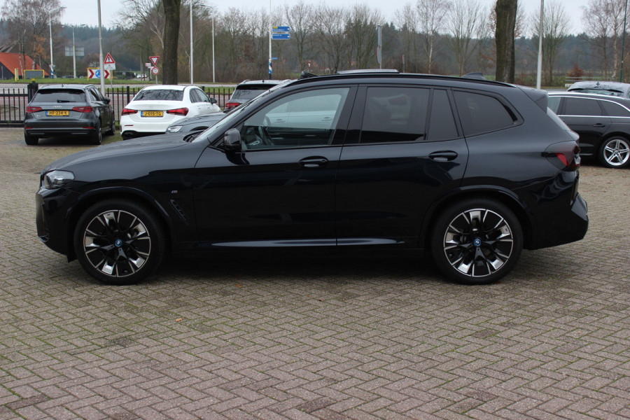 BMW iX3 High Executive 80 kWh / SoH 94.7% / Trekhaak / Panoramadak / 360Camera / Head-up / 20'' / Leder / Harman Kardon / Sfeerverlichting / Dodehoek / DAB / Stuur+Stoelverwarming / ACC