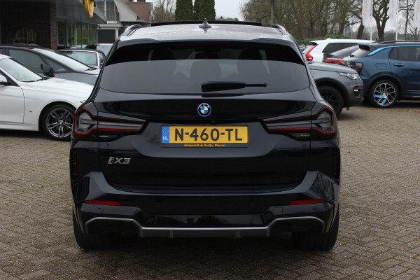 BMW iX3 High Executive 80 kWh / SoH 94.7% / Trekhaak / Panoramadak / 360Camera / Head-up / 20'' / Leder / Harman Kardon / Sfeerverlichting / Dodehoek / DAB / Stuur+Stoelverwarming / ACC