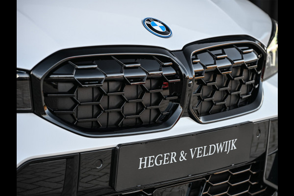 BMW 3-serie 330e | M-SPORT | SPORT SEATS | AMBIANCE INTERIEUR | ACTIVE CRUISE | DAB+ | HIFI SOUND | SHADOW-LINE | TREKHAAK | STUURVERWARMING