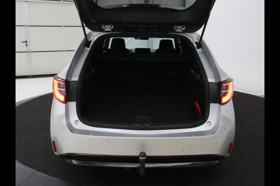 Toyota Corolla 1.8 Hybrid GR-Sport | Trekhaak | Stoelverwarming | Carplay | Camera | Sportstoelen | Park Assist | Half leder | Adaptive cruise | Climate control | Full LED | Keyless