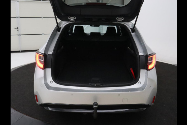 Toyota Corolla 1.8 Hybrid GR-Sport | Trekhaak | Stoelverwarming | Carplay | Camera | Sportstoelen | Park Assist | Half leder | Adaptive cruise | Climate control | Full LED | Keyless