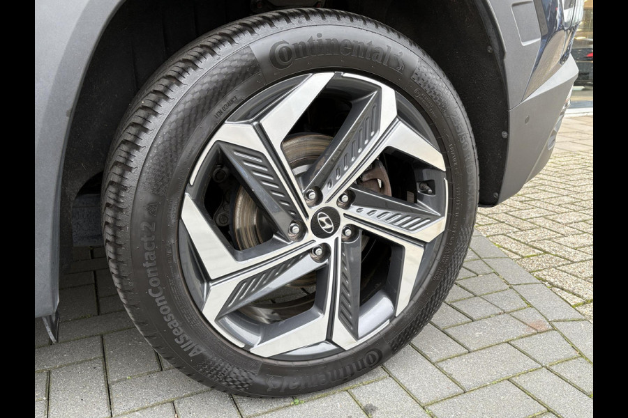Hyundai Tucson 1.6 T-GDI PHEV Premium 4WD | Leder | Stoelverwarming/koeling | Navigatie | Camera | Adaptive cruise control