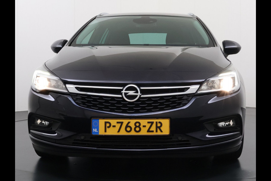 Opel Astra Sports Tourer 1.4 Turbo Trekhaak Navi Ecc Camera Pdc AGR-Comfort Stoel Apple Carplay Android Auto Stuur+Stoelverwarming Lane Assist Led Lmv 17" Regen-Lichtsensor Complete Opel Astra Tourer