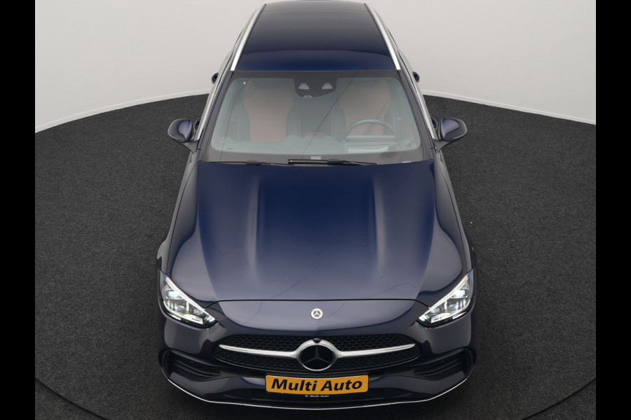 Mercedes-Benz C-Klasse Estate 300 e AMG Line Plug In Hybrid 313pk Dealer O.H. PHEV | Adaptive Cruise | Head Up | Camera | Digital LED | Bi Color Lederen Sportstoelen Verwarmd | Apple Carplay | Sfeerverlichting | Virtual | Navigatie | DAB |