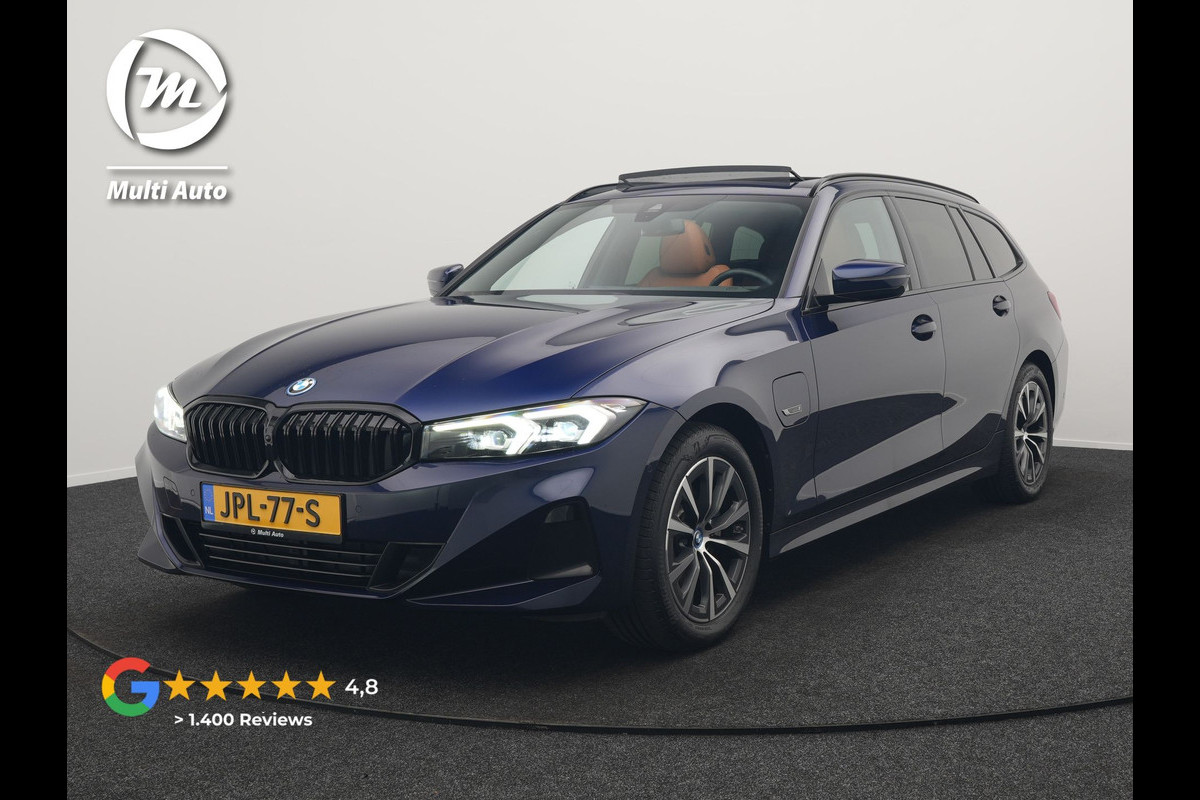 BMW 3 Serie Touring 320e Plug In Hybrid 204pk Dealer O.H. PHEV | Panodak | Widescreen Navi | Camera | Lederen Sportstoelen Verwarmd | Sfeerverlichting | Apple Carplay | Navigatie | Virtual | DAB | Tansanitblau II Metallic |