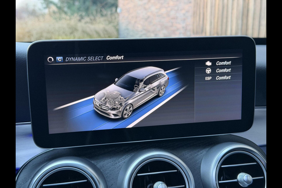 Mercedes-Benz C-Klasse Estate 180 AMG Automaat | Panorama | Leer | LED matrix | Sfeerverlichting | Apple CarPlay | 360°-camera | Night Pakket | DAB ont