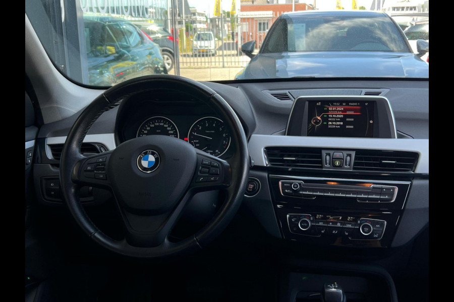 BMW X1 sDrive18i Centennial High Executive NL AUTO | CAMERA | STOELVERW | NAVI | TREKHAAK |