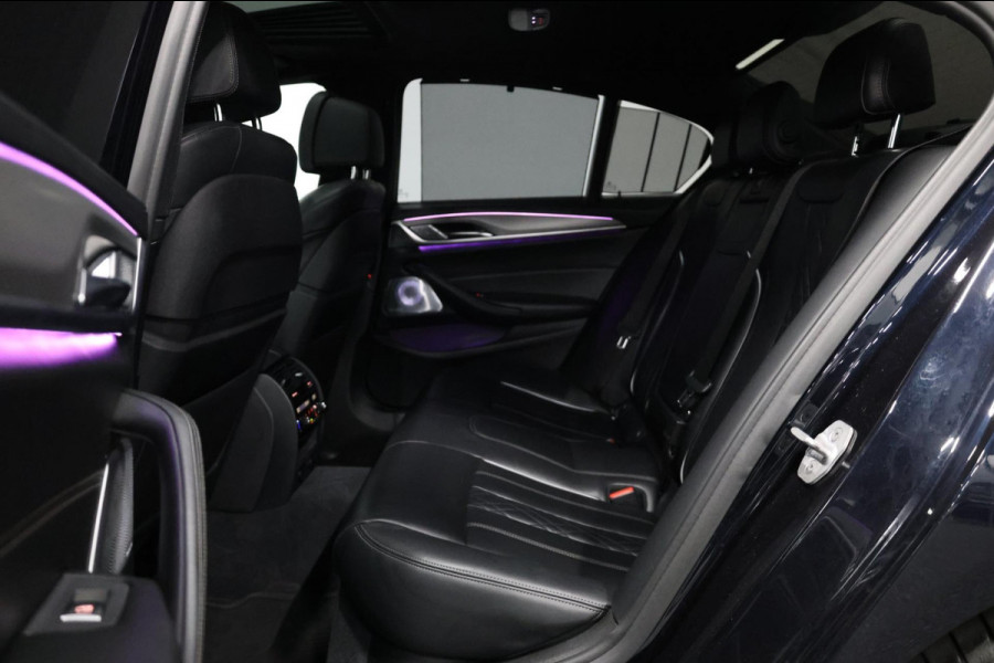 BMW 5 Serie M550i xDrive BOWERS&WILKINS/NIGHT/SOFTCLOSE/LEER+MASSAGE/20"/360 CAM/ACC/ECC/12 MND GARANTIE!
