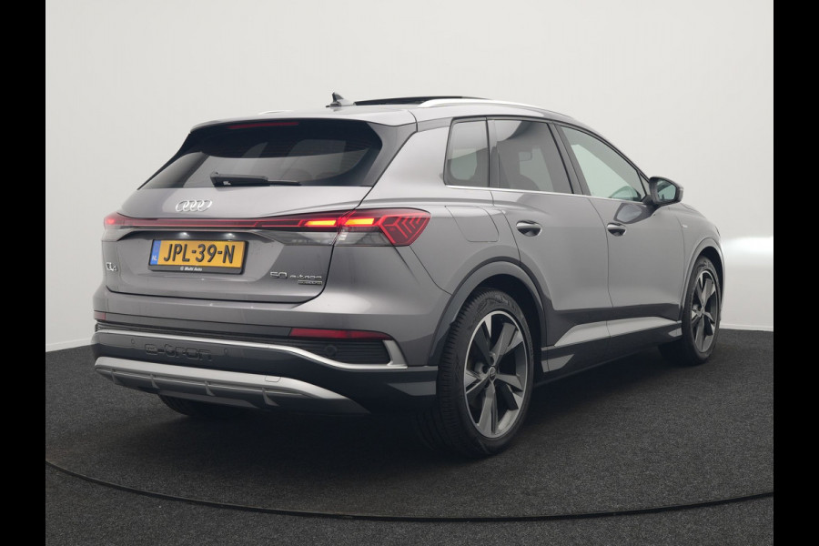 Audi Q4 e-tron 50 quattro S-Line 77 kWh 299pk Dealer O.H. Incl. BTW | Panodak | SOH 93,2% | Lederen Sportstoelen Verwarmd | 20"L.M  | Navigatie | Cruise Control | Virtual | DAB | Taifungrau Metallic |