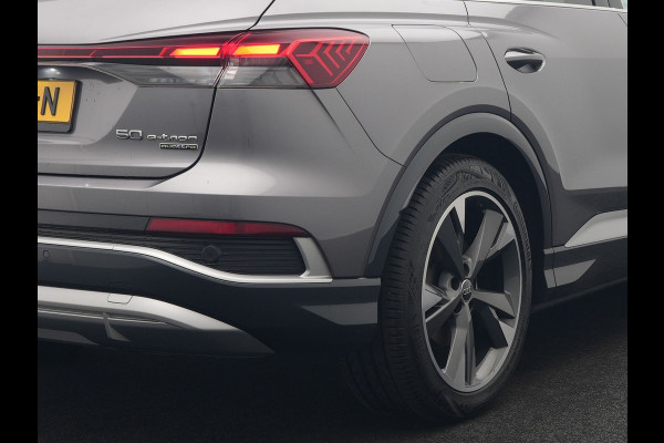 Audi Q4 e-tron 50 quattro S-Line 77 kWh 299pk Dealer O.H. Incl. BTW | Panodak | SOH 93,2% | Lederen Sportstoelen Verwarmd | 20"L.M  | Navigatie | Cruise Control | Virtual | DAB | Taifungrau Metallic |