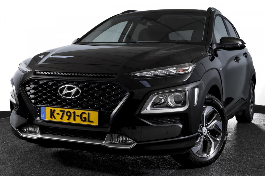Hyundai Kona 1.6 GDI HEV Comfort - Automaat | Cruise | PDC | Camera | NAV + App. Connect | ECC | Afn. Trekhaak | DAB | LM 16" |