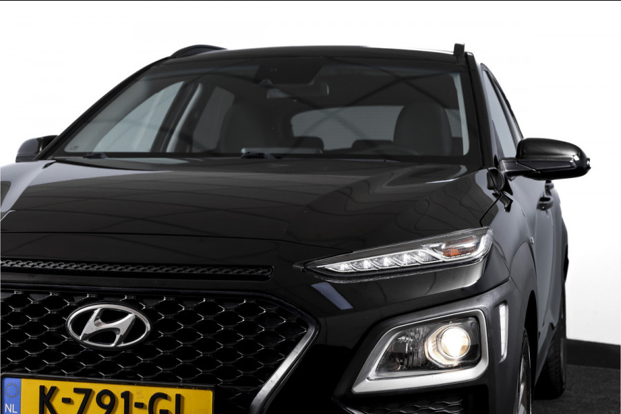 Hyundai Kona 1.6 GDI HEV Comfort - Automaat | Cruise | PDC | Camera | NAV + App. Connect | ECC | Afn. Trekhaak | DAB | LM 16" |