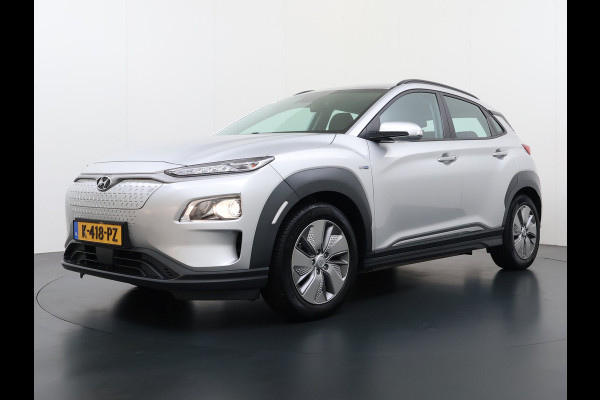 Hyundai Kona EV 64kWh Warmtepomp Adap.Cruise Navi Ecc Camera Pdc Trekhaak Krell®-Audio Apple Carplay Android Auto Comfort SOH 100% Lane Assist DAB Led Lmv 17" Regen-Lichtsensor Keyless 1e Eigenaar Origineel Nederlandse Auto
