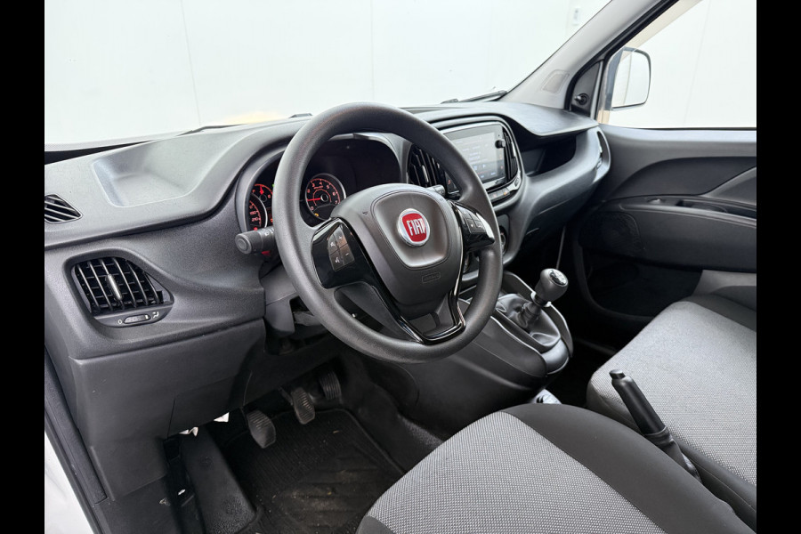 Fiat Doblò Cargo Trekking 1.6JTD 105PK L2H1 3-Peroons Airco Navi* Apple Carplay Android Auto Bluetooth S Trekking Euro 6 Betonplex Vloer Wandbetimmering Schuifdeur Origineel Nederlandse Auto 984kg laadvermogen! 1300kg trekvermogen!
