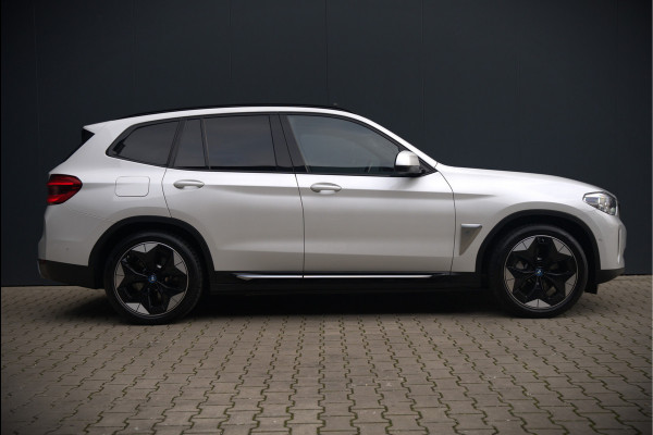 BMW iX3 High Executive 80 kWh | Panoramadak | Keyless | Stoelverwarming | Harman Kardon | Memory Seat | Head-Up Display | 360 Camera | Adaptief Onderstel | Trekhaak | Adaptive LED | Elektrische Stoelen | Apple Carplay | N