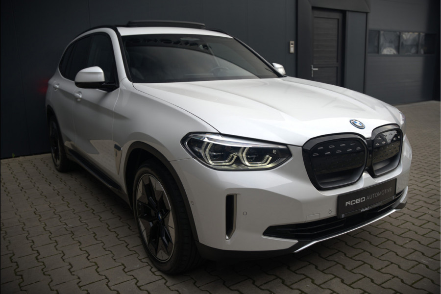 BMW iX3 High Executive 80 kWh | Panoramadak | Keyless | Stoelverwarming | Harman Kardon | Memory Seat | Head-Up Display | 360 Camera | Adaptief Onderstel | Trekhaak | Adaptive LED | Elektrische Stoelen | Apple Carplay | N